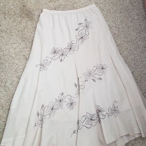 Beige full length skirt with brown floral etching
